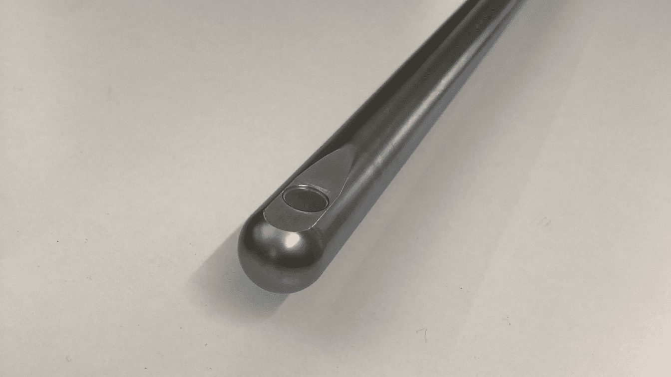 Close-up of the end of a metal probe showing an optical sensor window